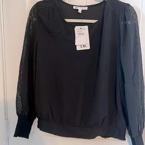 Black blouson top from Nordstrom Rack with sheer heart/polka dot detail sleeves